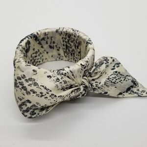 fabric wrapped hinged bangle with bow